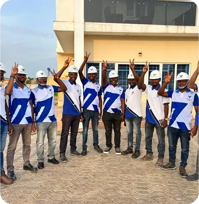 Solar panel installation team working on rooftop